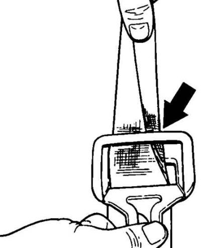 Checking the seat belt for broken threads or fraying