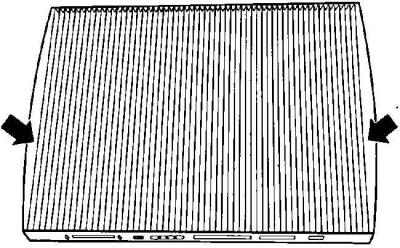 2. Press both clips (A) in the direction of the arrow and pull the filter element upwards.