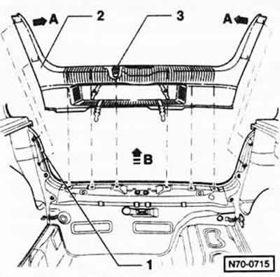 Lift and remove the luggage compartment bottom trim.