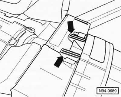 Using a screwdriver, unscrew the two upper screws and remove the lower steering column trim.