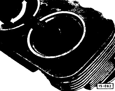 Perform lapping by rotating the valve using a valve grinder.