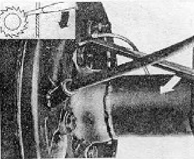 Figure 9.15. Loosening the rear brake shoe adjuster (Section 7).