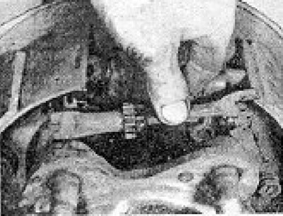 Photo 7.22. Installing the automatic regulator stand in place.
