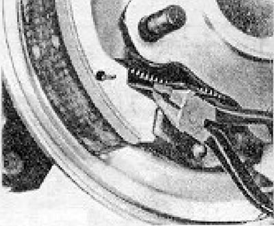 Figure 9.21. Attaching the lower brake shoe return spring (Section 7).