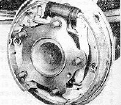 Figure 9.22. The handbrake cable adjusted to eliminate the gap at the point indicated by the arrow…