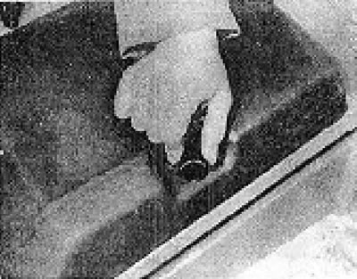 Photos 6B.4. Removing the cover behind the front seat.