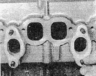 Photo 6B.84A. Installing new exhaust manifold gaskets...