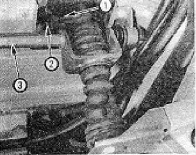 Снимка 9.14. Долен край на лоста за превключване на предавките: 1 - Затягащ ограничител; 2 - Опорна…