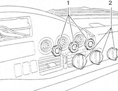 Figure 9.16. Unscrew the screws (arrows).