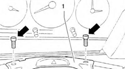 Figure 10.27. Remove the screws (arrows). Remove the top panel from the ignition switch on the…