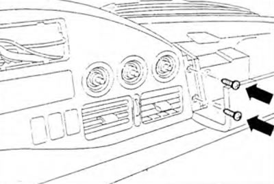 Figure 10.33. Open the glove compartment and remove the screws (arrow).