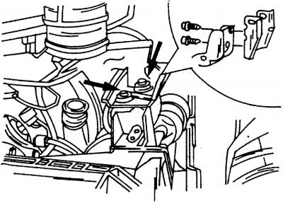 Рис. 246. Места расположения болтов крепления (показаны стрелками) кронштейна подвески на коробке…