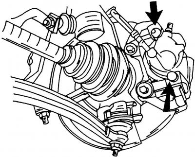 Рис. 313. Места расположения защитных колпачков направляющих пальцев (показаны стрелками)