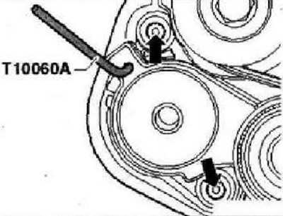 Выкрутить винты крепления «стрелки»натяжного элемента и снять натяжной элемент. Удерживать вал…