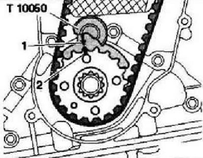 Инструкция: Метки на зубчатом шкиве коленвала «2» и фиксаторе коленвала «T10050» «1» должны…
