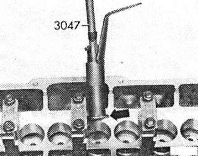 6. Свалете капачката на масления дефлектор.